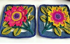 two crocheted squares with flowers on them