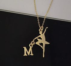 Ballerina necklace with Initial charm. Ballet necklace with dainty letter charm. Personalized Dancer gold necklace. Gift for Dancer girl by HeadsortailsDesigns on Etsy Birthday Letter-shaped Name Charm Necklaces, Ballerina Necklaces, Ballet Jewelry, Ballet Necklace, Ballet Charm Bracelet, Ballerina Necklace, Brass Necklace, Letter Charms, Initial Charm