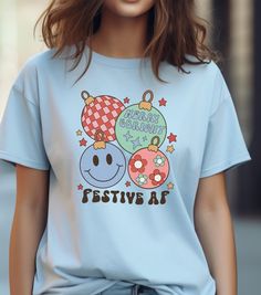 A festive T-Shirt featuring 4 vintage ornaments and the phrase Merry & Bright Festive AF. This shirt exudes a joyful and celebratory vibe, perfect for the holiday season and festive occasions. It is relevant to individuals who enjoy spreading cheer and celebrating in style. Product features - Knitted in one piece without side seams - Ribbed knit collar for elasticity - Made from strong and smooth specially spun fibers - Classic fit for comfy wear and tear-away label for scratch-free experience - Plus Sizes Available - Sizes: S-5XL - More Colors Available - Message Me If You're Interested  Care instructions - Machine wash: warm (max 40C or 105F) - Non-chlorine: bleach as needed - Tumble dry: medium - Do not iron - Do not dryclean Ornaments Shirt, Merry Bright Christmas, Bright Christmas, Xmas Shirts, Vintage Ornaments, Christmas Shirt, Merry And Bright, Christmas Shirts, Unisex T Shirt