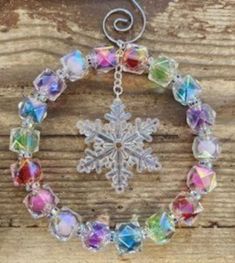 a snowflake bracelet with multicolored beads