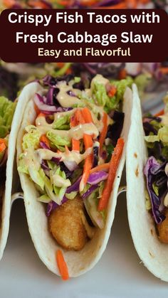 three fish tacos with cabbage slaw and carrots