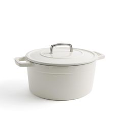 a white casserole dish with a handle on the top and bottom, sitting against a white background