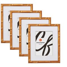 three gold frames with black and white designs