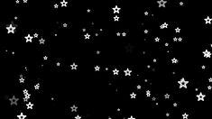 black and white stars flying in the night sky