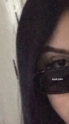 a close up of a person wearing blindfolds with the words tuck you on them