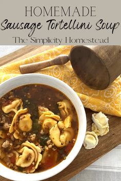 homemade sausage tortellini soup in a white bowl