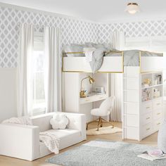 a child's bedroom with white furniture and wallpaper, including a loft bed