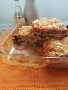 some food in a glass dish on a table