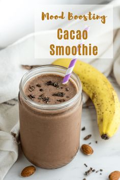 a smoothie in a mason jar with a banana and chocolate topping on the side