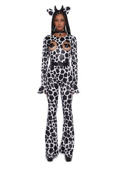 a woman wearing a giraffe costume with cutouts on the chest and long sleeves