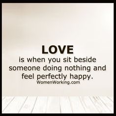 a white wooden floor with the words love is when you sit beside someone doing nothing and feel perfectly happy