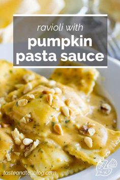 ravioli with pumpkin pasta sauce in a white bowl