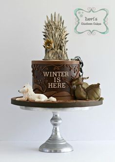 a game of throne cake on top of a table