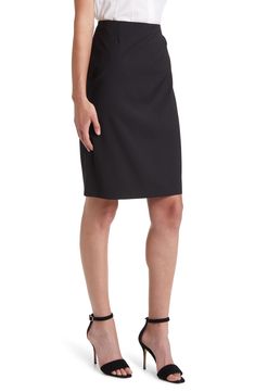 Bring modern style to your work-to-weekend wardrobe with this pencil skirt crafted from pure virgin wool. 23" center front length (size 8)   Lined   100% virgin wool   Dry clean   Imported   Hugo Boss/BOSS/HUGO has received the Fair Labor Association accreditation, which signifies that the company has effective systems and procedures in place to successfully uphold fair labor standards throughout its supply chains, including strategies and tools to address and improve working conditions Chic Business Knee-length Pencil Skirt, Chic Knee-length Pencil Skirt For Business, Tailored Pencil Skirt For Workwear, Tailored Elegant Business Skirt, Sleek Knee-length Lined Pencil Skirt, Classic Tailored Pencil Skirt For Office, Chic Tailored Knee-length Pencil Skirt, Tailored Knee-length Skirt For Work, Tailored Pencil Skirt For Office