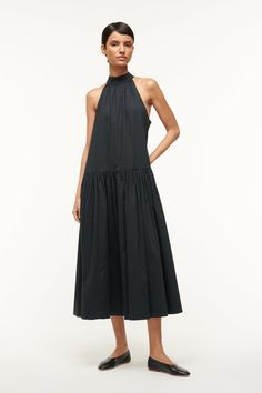 Embody casual elegance in the Midi Marlowe dress by Staud! This black cotton poplin dress has an adorable halter tie which looks especially cute tied as a bow. Maxi Dress Outfits, Cotton Poplin Dress, Sleeveless Midi Dress, Poplin Dress, Peplum Hem, Black Maxi, Denim Flares, Midi Dress Sleeveless, Fashion Books