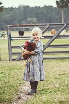 Girl picking up a chicken on the farm****FOLLOW OUR UNIQUE GARDENING BOARDS AT www.pinterest.com/earthwormtec*****FOLLOW us on www.facebook.com/earthwormtec & www.google.com/+earthwormtechnologies for great organic gardening tips #children #garden #chicken Country Kids, A Chicken, Farm Girl, Family Farm, Little People, Country Life, Little Sisters, The Farm