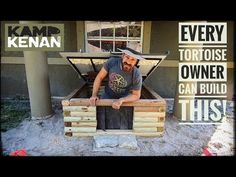 a man sitting on top of a wooden bench made out of pallets and logs