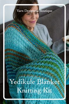 a woman sitting on a couch with a knitted blanket in front of her and text overlay that reads, yedikule blanket knitting kit yarn