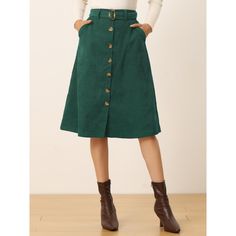 Indulge in a perfect blend of comfort and style with this ribbed corduroy A-line skirt. The high-fitted waist and slightly flared hem add a touch of elegance to the skirt, while the matching waist tie accentuates your curves, creating a flattering silhouette. The elastic waist and belted detail make it comfortable to wear all day long. This versatile skirt is suitable for any occasion, be it a party, a day out shopping, or a day at the office. The midi length adds a touch of sophistication to th High Waist Corduroy Skirt For Fall, High Waist Corduroy Skirt With Pockets, High-waist Corduroy Skirt For Fall, Green Knee-length Lined Skirt, Casual Corduroy Skirt With Button Closure, Midi Skirt With Pockets, Midi Flare Skirt, Parisian Chic Style, Midi Length Skirts