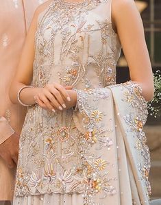 Beige Dress With Intricate Embroidery For Reception, Beige Wedding Dress With Intricate Embroidery, Elegant Wedding Dress For Reception, Elegant Festive Evening Dress For Wedding, Hand Embellished Gown For Wedding Party, Elegant Wedding Evening Dress, Elegant Wedding Gown For Festive Occasion, Beige Resham Embroidery Wedding Dress, Beige Resham Embroidered Wedding Dress