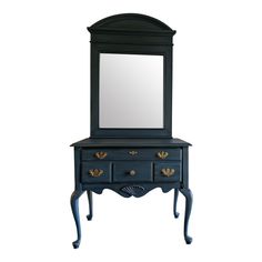 an antique dresser with mirror on top and gold knobs at the bottom, against a white background