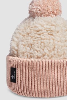 Designed for fun on and off the slopes, this beanie is characterized by its plush texture. Featured in teddy, the accessory is complemented by a knit bottom and playful pom pom. Teddy Accessories, Beanie With Pom Pom, Pompom Beanie, Shoes For Children, Beanie With Pom, Personalized Jacket, Cashmere Beanie, Pink Teddy, Ski Accessories