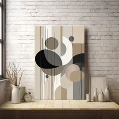 an abstract painting hangs on the wall next to a table with vases and potted plants