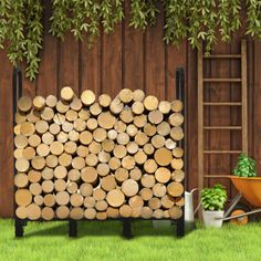 a pile of logs sitting in the grass next to a wheelbarrow and potted plant