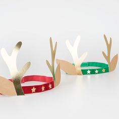 Why wear plain party hats when you, and your guests, can look reindeer remarkable in luxury velvet and gold foil? These fun antler headbands feature velvet elastic details, teamed with gold foil antlers and stars, and kraft paper ears. They're perfect for kids and adults. 8 Reindeer, Christmas Headwear, Whimsical Crafts, Christmas Party Hats, Red And Light Blue, Chocolate Lollies, Christmas Tree Embroidery, Chevron Art, Antler Headband