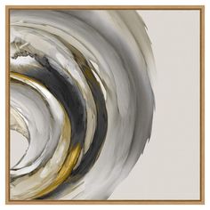 an abstract painting in gold and grey with a white frame on the wall above it