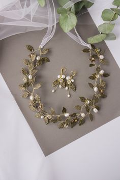 *This bohemian hair vine made with about 50 small brass leaves, to a flexible brass headband that sits securely and comfortably on your head while you celebrate and dance the night away on your wedding day! * Hair vine measures    about 2.7 inches (7 cm) (at its widest part)   length 35 cm ( 13.7 inches ) * Earrings measures     about 4 cm * 2 cm (1.5 *0.7 inches) * Groom's brooch measures     about 5 cm * 2.5 cm (1.9 *0.9 inches) * Flexible and bendable. * The bridal headpiece will be packed in a gift box! * Hand made in our studio. *More brass crowns* https://www.etsy.com/listing/761959939/brass-floral-bridal-tiara-wedding-crown?ga_order=most_relevant&ga_search_type=all&ga_view_type=gallery&ga_search_query=brass+floral+hair+vine&ref=sr_gallery-1-3&organic_search_click=1&pro=1 Custom orde Gold Wedding Headpiece For Spring, Fitted Vintage Gold Headpiece, Bohemian Gold Crown Headpiece, Whimsical Gold Wedding Headpiece, Gold Floral Hair Piece, Floral Hair Vine, Brass Crown, Art Nouveau Weddings, Pearl Hair Vine