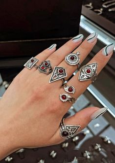 Searching for different types of rings in a set? This set of 7 rings sterling silver 925 adjustable Armenian handmade rings are what you will obviously love! All rings are adjustable. The rings have small artificial red garnet stones. The rings are made in Armenian traditional style. They are covered with pretty ornament. These rings will be a welcomed gift for a woman who loves traditional ethnic jewelry. FREE SHIPPING Worldwide (tracked) RINGS: Weight of the rings is approx. 4-6 grams All ring Different Types Of Rings, Armenian Jewelry, Black Onyx Jewelry, Red Rings, Ring Bearer Outfit, Rings Sterling Silver, Red Stones, Arm Jewelry, Malachite Jewelry