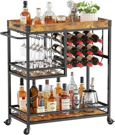 a bar cart filled with lots of bottles and glasses