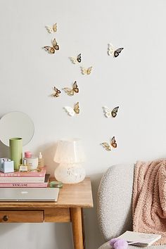 there are many butterflies on the wall in this room, and it's easy to do