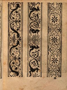 an old book with decorative designs on it