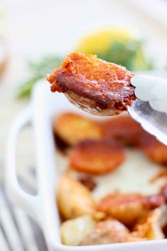 a close up of a spoon with food in it