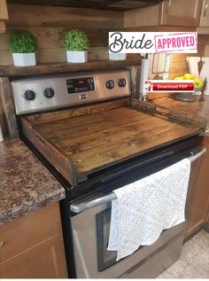 a stove top oven sitting inside of a kitchen next to a counter with fruit on it