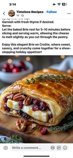 a cranberry and pecan filled pastry on a wooden cutting board with the recipe below it