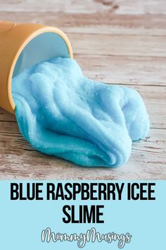 blue raspberry ice slime on a wooden table with text overlay that reads,