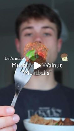 a man eating food with a spoon in his hand and the caption reads let's make munch to walnut meatballs