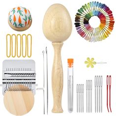 an assortment of crafting supplies such as knitting needles, scissors, and yarn sticks