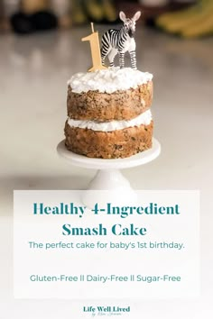 a cake with a zebra figurine on top and the words healthy 4 - ingredient smash cake