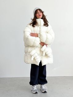 "Step into cold weather with an oversized winter jacket. Long sleeves and water repellent fabric finish - which encourages water to bead off its surface.  Plush poly fill adds extra warmth - 100% Recycled Polyester. Suitable for temperatures up to -20С / -4.0℉ More jackets here: https://www.etsy.com/shop/ArtVyshyvankaUA?ref=seller-platform-mcnav§ion_id=39368873 🔷Model is 168cm/5'5\" and wearing size S ----------------------------------------------------------------------------------------------------- 🔷DETAILS: -front zip closure -long sleeves -water repellant ----------------------------------------------------------------------------------------------------- 🔷CARE: machine washable 30-40C (95-105F)  -------------------------------------------------------------------------------------- White Duck Down Outerwear For Fall, Winter Oversized Duck Down Outerwear, Winter White Duck Down Puffer Outerwear, Winter White Duck Down Puffer Jacket, Oversized Nylon Puffer Jacket For Cold Weather, Winter White Nylon Puffer Outerwear, White Duck Down Outerwear For Cold Weather, Winter White Puffer Parka For Cold Weather, Winter White Down Puffer Jacket