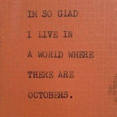 an orange book with black writing on it that says i'm so glad i live in a world where there are octobers