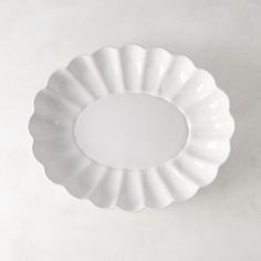 a white plate sitting on top of a table