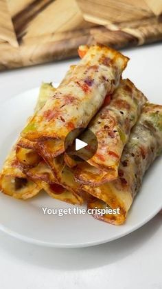 a white plate topped with food on top of a table