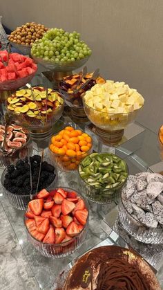 an assortment of desserts and pastries on display