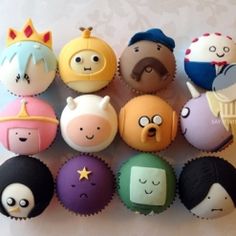 cupcakes decorated with cartoon characters on them