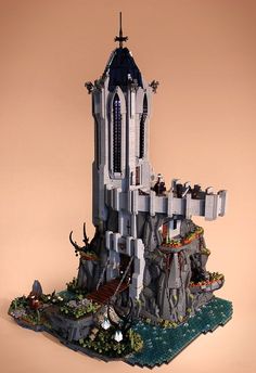 a lego castle made to look like it's built on top of a hill