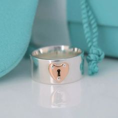 Authentic Tiffany & Co Final Price Do Not Offer Rare Find Metal: Silver & Rose Gold Condition: Used (You Can Take It To Tiffany For Polishing) Size: 4.5 Jewelry Tiffany, Heart Lock, Tiffany Co Jewelry, Tiffany Heart, Silver Rose Gold, Womens Jewelry Rings, Tiffany & Co., Rose Gold Ring, Gold Ring